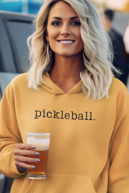 woman wearing a pickleball sweatshirt hoodie