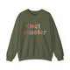 Military green sweatshirt with retro Net Master text design and sparkle accents