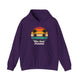 Purple pickleball hoodie with a retro sunset circle with silhouetted palm trees and "West Coast Pickleball" script text