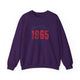 Purple pickleball crewneck sweatshirt with a distressed collegiate-style "Bainbridge Island 1965 WA" text stack in navy and coral