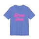 Heather Columbia blue pickleball t-shirt with a pink script Drop Shot text design