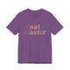 Heather team purple t-shirt with retro Net Master text design and sparkle accents