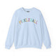 Light blue crewneck sweatshirt with a colorful arched PICKLEBALL text design