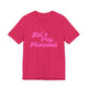 Fuchsia pickleball t-shirt with a pink script Let's Play Pickleball text design