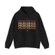 Black hoodie with PICKLEBALL repeated in a stacked gradient text design with heart accents