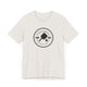 Vintage White pickleball t-shirt with a circular Pickleball Bainbridge Island badge logo