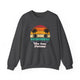 Dark Heather pickleball crewneck sweatshirt with a retro sunset circle with silhouetted palm trees and "West Coast Pickleball" script text