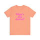 Sunset orange pickleball t-shirt with a pink script What's the Score text design