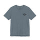 Heather slate t-shirt with a small black PICKLEBALLER chest logo featuring crossed paddles