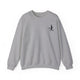 Pickleball sweatshirt with a small silhouette of a person swinging a pickleball paddle on the chest