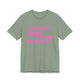 Sage pickleball t-shirt with a pink script We Wear Pink and Play Pickleball text design
