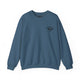 Indigo blue crewneck sweatshirt with a small PICKLEBALLER chest logo featuring crossed paddles