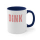 White mug with a Navy accent and a bold "DINK" wordmark