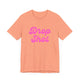 Sunset orange pickleball t-shirt with a pink script Drop Shot text design
