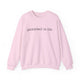 Light pink pickleball sweatshirt with a "pickleball is life." text design