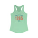 Solid Mint pickleball racerback tank top with a distressed collegiate-style "Bainbridge Island 1965 WA" text stack in navy and coral
