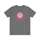 Deep Heather pickleball t-shirt with a pink smiley face graphic over "Pickleball" text