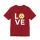 Canvas red t-shirt with a LOVE text design and a yellow pickleball replacing the O