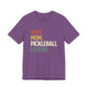 Heather team purple t-shirt with a retro WIFE. MOM. PICKLEBALL LEGEND. text design