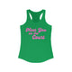 Solid kelly green women's pickleball racerback tank top with a pink script Meet You on the Court text design