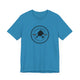 Aqua pickleball t-shirt with a circular Pickleball Bainbridge Island badge logo