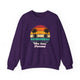 Purple pickleball crewneck sweatshirt with a retro sunset circle with silhouetted palm trees and "West Coast Pickleball" script text