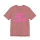 Heather mauve pickleball t-shirt with a pink script We Wear Pink and Play Pickleball text design