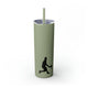 Glitter Seascape skinny tumbler with straw and a silhouette illustration of a pickleball player mid-swing