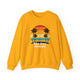 Gold pickleball crewneck sweatshirt with a retro sunset circle with silhouetted palm trees and "West Coast Pickleball" script text