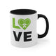 White mug with a Black accent and "LOVE" text with a paddle-and-ball heart icon