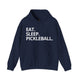 Navy hoodie with Eat. Sleep. Pickleball. text design