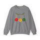 Graphite heather crewneck sweatshirt with pickleballs styled as Christmas ornaments hanging from a holly branch