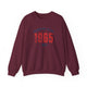 Maroon pickleball crewneck sweatshirt with a distressed collegiate-style "Bainbridge Island 1965 WA" text stack in navy and coral