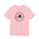 Pink pickleball t-shirt with a circular Pickleball Bainbridge Island badge logo