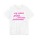 White pickleball t-shirt with a pink script We Wear Pink and Play Pickleball text design