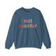 Indigo blue sweatshirt with retro Net Master text design and sparkle accents
