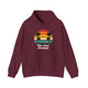 Maroon pickleball hoodie with a retro sunset circle with silhouetted palm trees and "West Coast Pickleball" script text