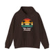 Dark Chocolate pickleball hoodie with a retro sunset circle with silhouetted palm trees and "West Coast Pickleball" script text