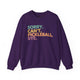 Purple crewneck sweatshirt with a colorful Sorry. Can't. Pickleball. Bye. text design
