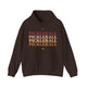 Dark chocolate hoodie with PICKLEBALL repeated in a stacked gradient text design with heart accents