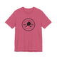 Heather Raspberry pickleball t-shirt with a circular Pickleball Bainbridge Island badge logo