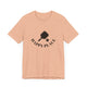 Heather Peach pickleball t-shirt with a paddle and ball icon over "Happy Place" text