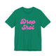 Kelly green pickleball t-shirt with a pink script Drop Shot text design