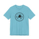 Turquoise pickleball t-shirt with a circular Pickleball Bainbridge Island badge logo