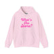 Light pink pickleball hoodie with a pink script What's the Score text design