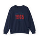 Navy pickleball crewneck sweatshirt with a distressed collegiate-style "Bainbridge Island 1965 WA" text stack in navy and coral