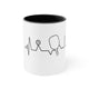 White mug with a Black accent and a heartbeat-line illustration incorporating a paddle and pickleball