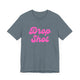 Heather slate pickleball t-shirt with a pink script Drop Shot text design