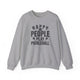 Pickleball sweatshirt with bold stacked "HAPPY PEOPLE PLAY PICKLEBALL" text and crossed paddles graphic