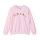 Light pink crewneck sweatshirt with a colorful arched PICKLEBALL text design